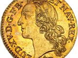 une pièce d'or représentant la tête d'une femme aux longs cheveux