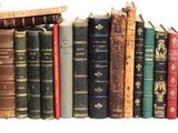 un grand nombre de livres empilés les uns sur les autres