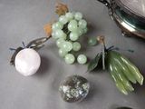 a bunch of green grapes and other items sitting on a table