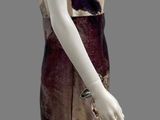 a mannequin dressed in a dress and a hat