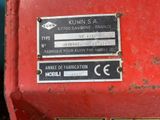 a close up of a label on a red machine