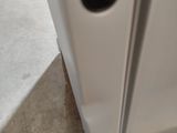a close up view of a door handle on a refrigerator