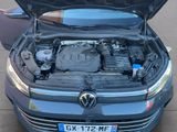 a car with its hood open and the engine in the trunk