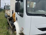 a white truck that is parked on the side of the road