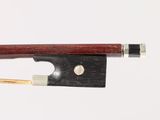 the bow is made of wood and has a metal tip
