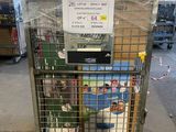 a cart that has a lot of items inside of it