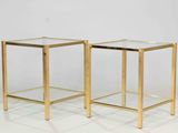 pair of brass side tables with glass tops