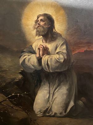une peinture à l'huile représentant un homme agenouillé sur une colline, avec une auréole au-dessus de la tête
