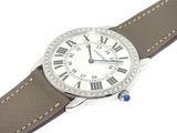 an image of a close up of a wrist watch with roman numerals