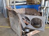 a large machine that is sitting inside of a building
