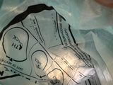 a person holding a piece of paper with a map on it
