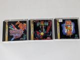 three nintendo games are sitting on a white surface