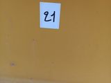 a sign on the side of a building that says 24