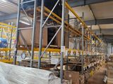a large warehouse filled with lots of boxes and pallets