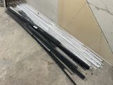 a lot of black and white sticks laying on the ground