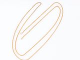 a gold necklace with a chain that is attached to it