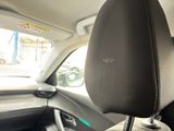 an image of a car interior with a steering control