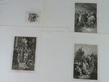 several black and white pictures of people and animals on a wall