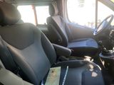 the interior of a car with two black seats and a steering wheel