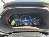 the dashboard of a car with a digital display on it