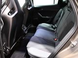 a seat in the back of a car with a seat belt
