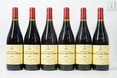 six bottles of red wine are lined up in a row