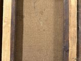 an old picture frame with a rope hanging from it ' s sides