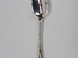 a spoon that is sitting on a table