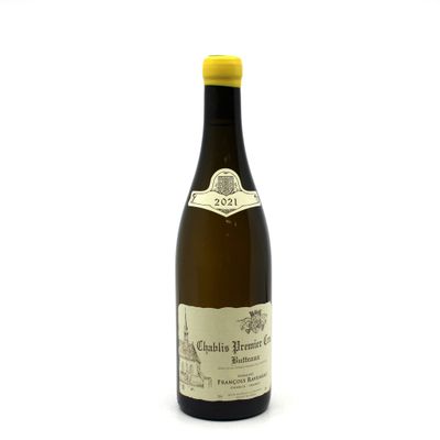 a bottle of wine that is sitting on a table