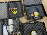 many different types of equipment in a case on the floor
