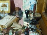 a glass table with a book and various items on it