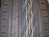 a close up of a tire on a wooden surface