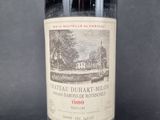 a bottle of wine that is sitting on a table