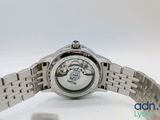 an image of a close up of a watch on a white surface
