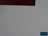 a picture of a clock on the wall of a building