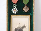 a picture of a framed picture of a man on a horse