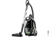 a black and white photo of a vacuum cleaner on a white background