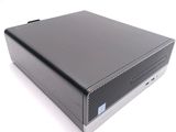 an image of a black desktop computer sitting on top of a white surface