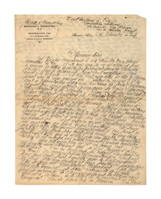a letter written in cursive handwriting on a piece of paper