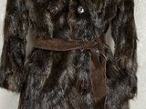 an image of a fur coat on a mannequin