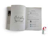 an open book with a drawing of a bathtub in it