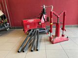 a red machine that is sitting on the floor
