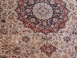 a large oriental rug on the floor in a living room