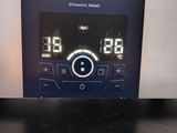 an image of a digital clock sitting on top of a table