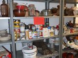 a shelf with many different items on it in a room