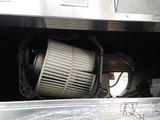 a air filter that is attached to the side of a truck