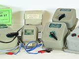 many different types of electrical equipment sitting on a table