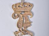an image of a gold crown on top of a white background
