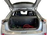 a trunk of a car with a bunch of wires in it