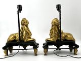 pair of gilded bronze lions on benches on a white background
